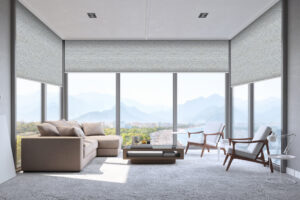 Interior of a contemporary minimalist living room with beautiful mountain, ocean and beach view.