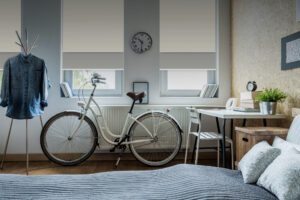 Trendy white city bicycle in bright bedroom