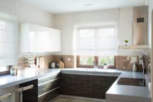 Horizontal view of beige kitchen interior design